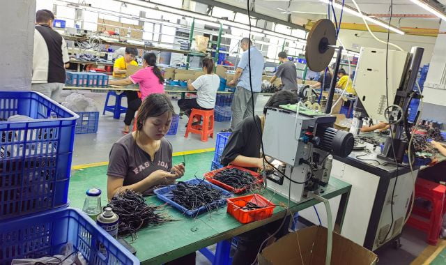 Kalefu Electronics factory floor with production lines for gaming consoles